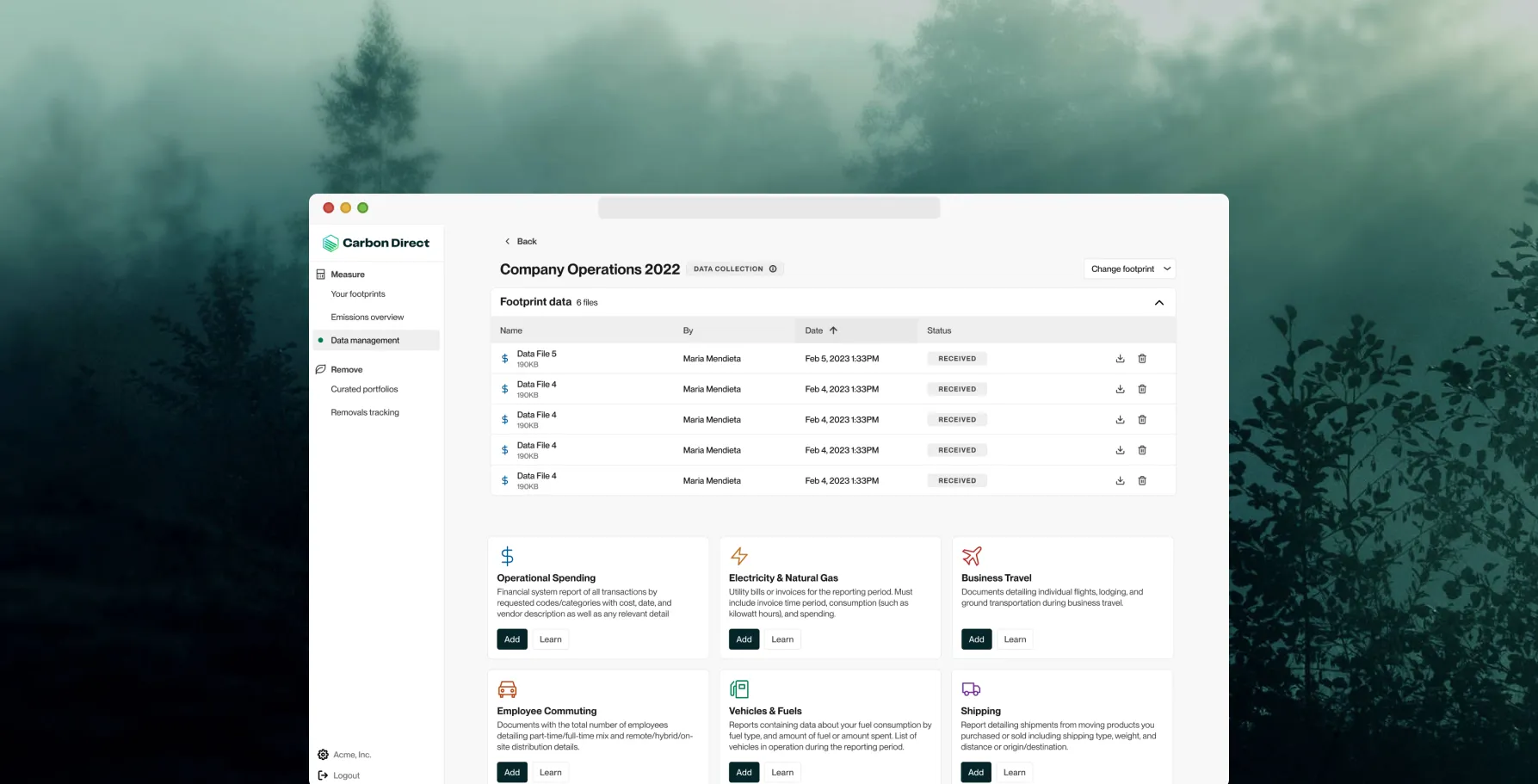 Carbon Direct's company operations dashboard listing emissions data sources, shown over a photograph of fog in a forest